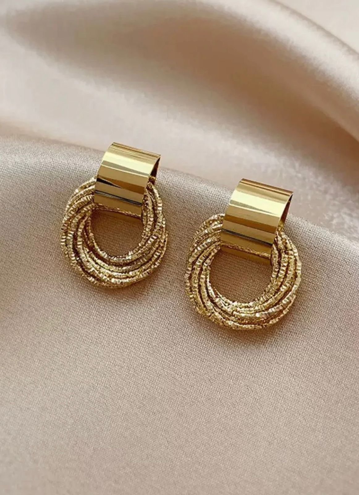 Gold toned lux earrings